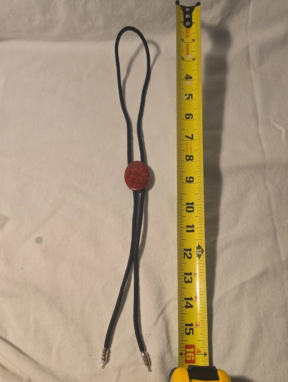 Adjustable Black Cord Bolo Tie with Red Stone Accent
